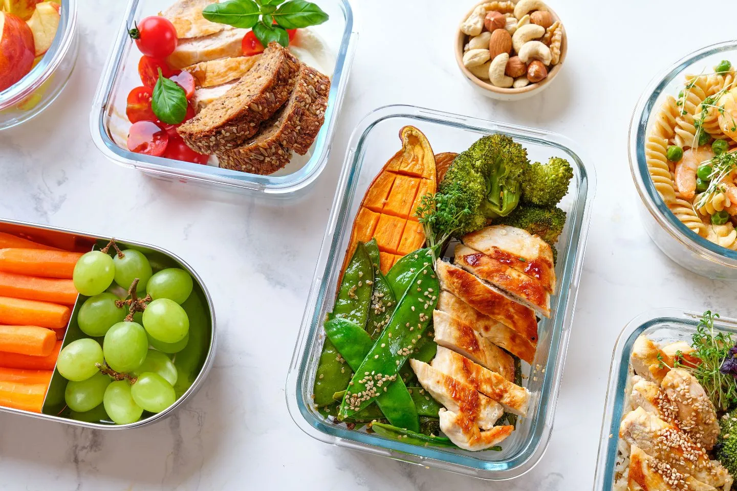 Prepared dish components lined up on a counter surface.